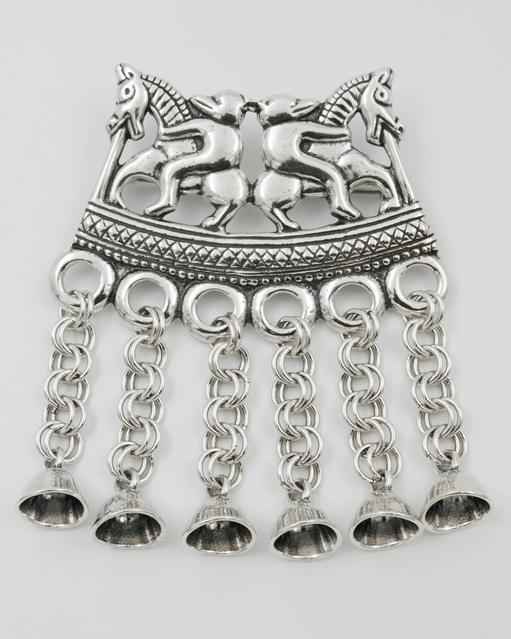 Held Two Horsemen brooch silver